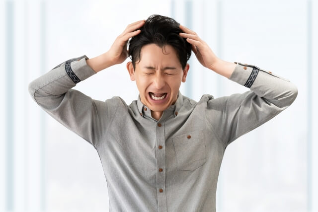 頭を抱える一人社長